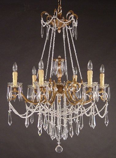 aged-brass-chandelier-interior design marbella